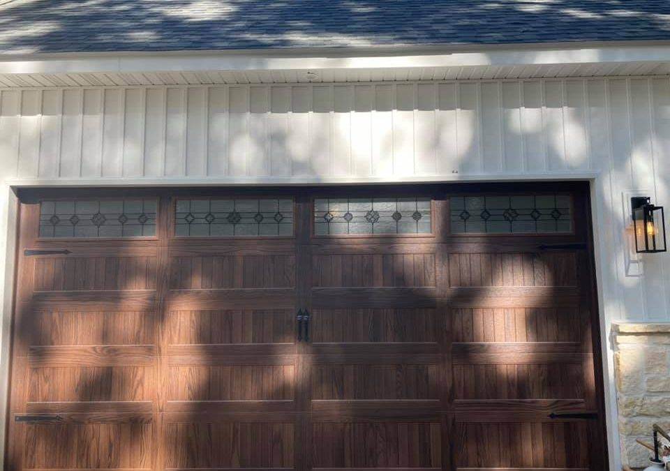 C.H.I. Stamped Carriage House Door with Designer Glass for Two-Car Garage